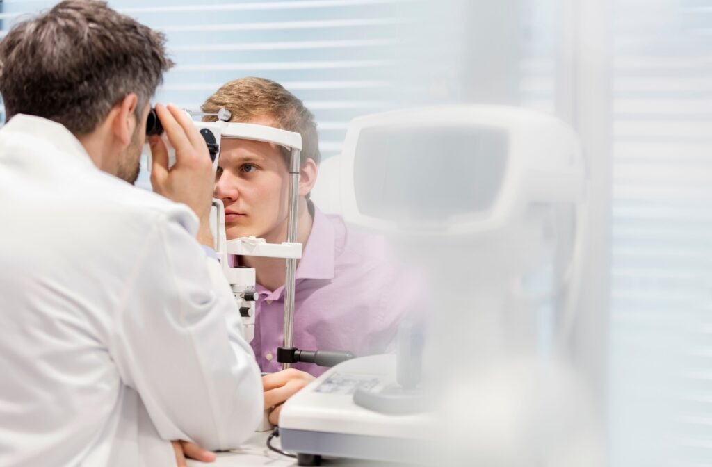 A patient having their eyes examined by an optometrist.